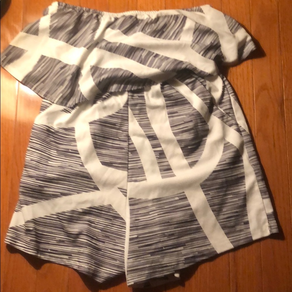 strapless romper with black and white detailing